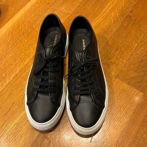 Woman Common Projects platform black sneakers